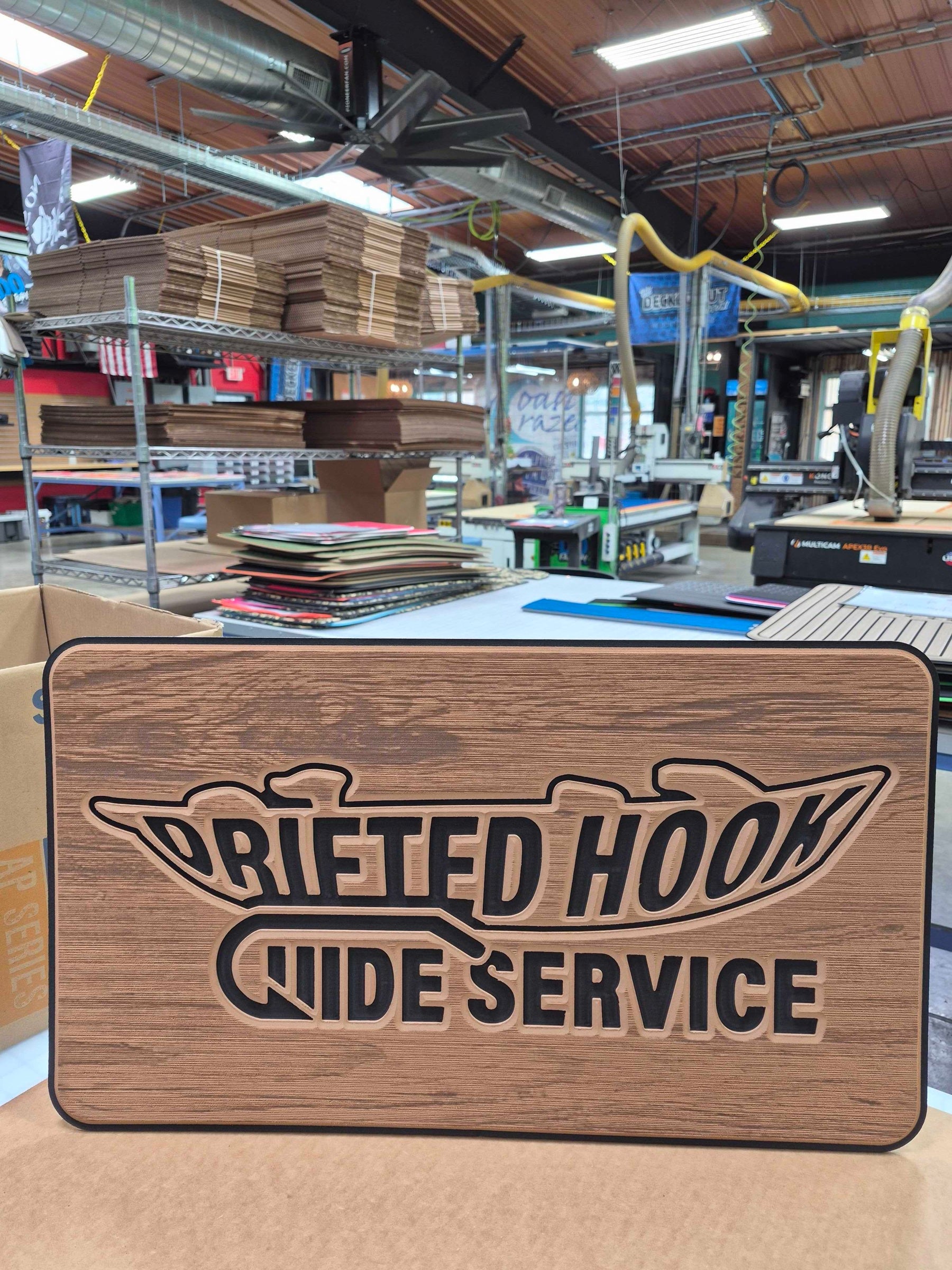 Drifted Hook Guide Service custom logo cooler top pad, freshly cut on the Decked Out Factory shop floor