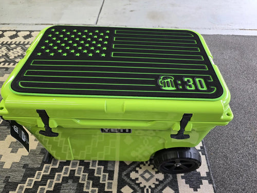 Beer thirty American flag cooler top pad on a green Yeti cooler