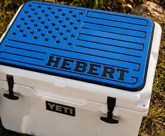 Hebert blue American flag cooler top pad with name on a white Yeti cooler